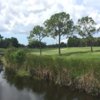 A view over the water of a hole from Clearwater Country Club.