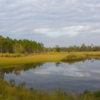 A view over the water from Origins Golf Club