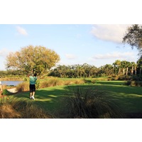 The sixth hole on the Osprey nine at Raptor Bay Golf Club is a short but tough par 3. 